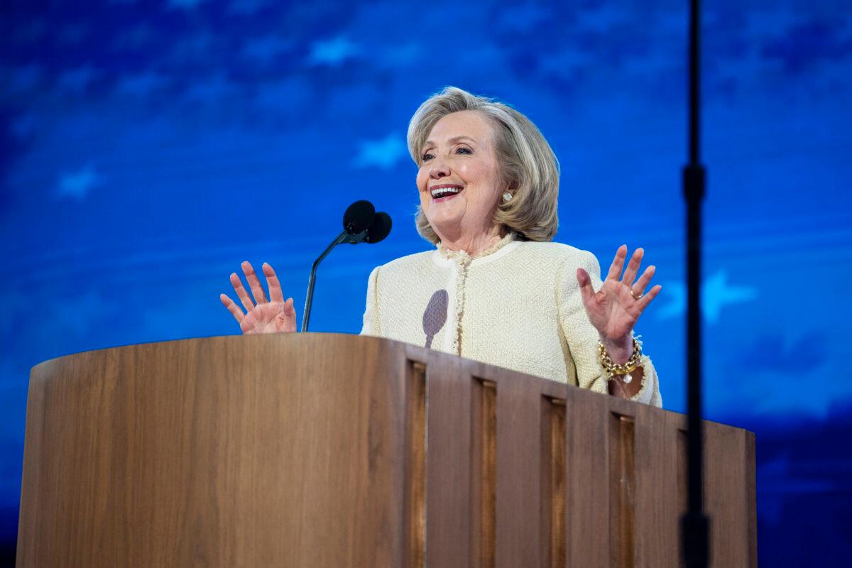 Former U.S. Secretary of State Hillary Clinton speaks at the United Center on the first day of the Democratic National Convention in Chicago on Aug. 19, 2024. (Madalina Vasiliu/The Epoch Times)