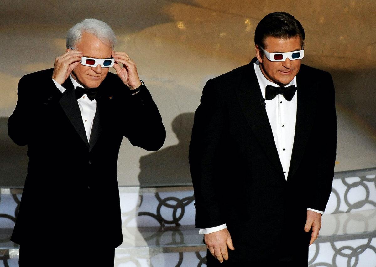 Comedian Steve Martin and actor Alec Baldwin don 3-D glasses as they co-host the 82nd Academy Awards at the Kodak Theater in Hollywood, Calif. on March 7, 2010. (Gabriel Bouys/AFP via Getty Images)