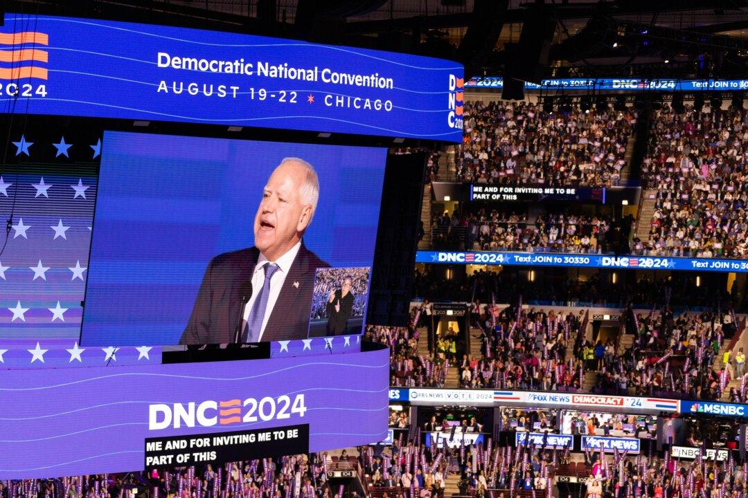 Vice Presidential nominee Tim Walz speaks to supporters at the 2024 DNC in Chicago on Aug. 21, 2024. (John Fredricks/The Epoch Times)