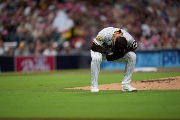 Padres pitcher Dylan Cease agonizes after giving up a fourth-inning RBI single to the Mets' Jeff McNeil in San Diego on Aug. 22, 2024. (Gregory Bull/AP Photo)