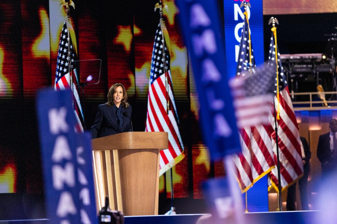 Presidential candidate and Vice President Kamala Harris speaks at the 2024 DNC held in Chicago on Aug. 22, 2024. (John Fredricks/The Epoch Times)