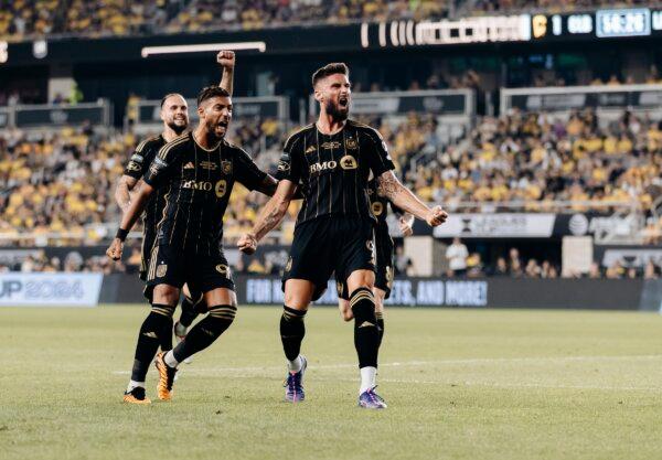 LAFC forward Olivier Giroud (9) celebrates with Denis Bouanga (99) following his first goal for the club in the Leagues Cup final against the Columbus Crew in Columbus, Ohio, on Aug 25, 2024. (Courtesy of Los Angeles FC via The Epoch Times)