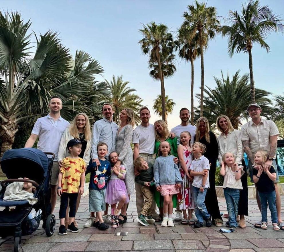 Dad Harmony with their partners and children. (Courtesy of <a href="https://www.instagram.com/dad_harmony/">Dad Harmony</a>)