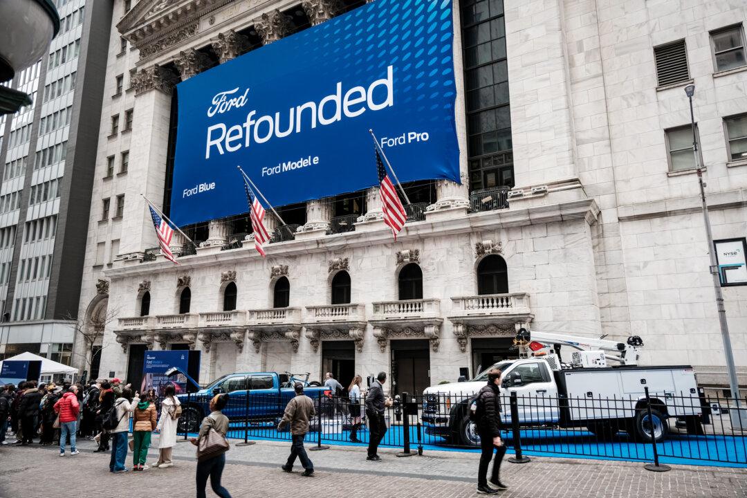 Ford electric trucks are displayed outside the New York Stock Exchange on March 23, 2023. (Spencer Platt/Getty Images)