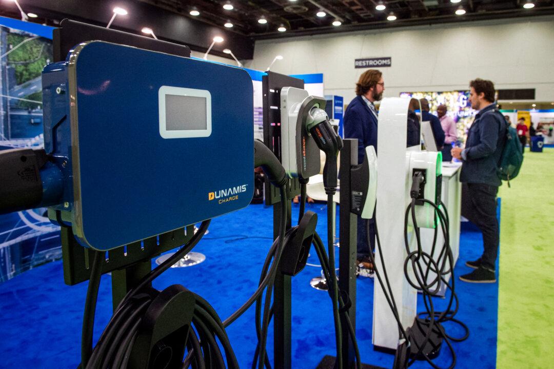 Electric car chargers on display during the North American International Auto Show at the Huntington Place convention center in Detroit on Sept. 14, 2023. (Matthew Hatcher/AFP via Getty Images)