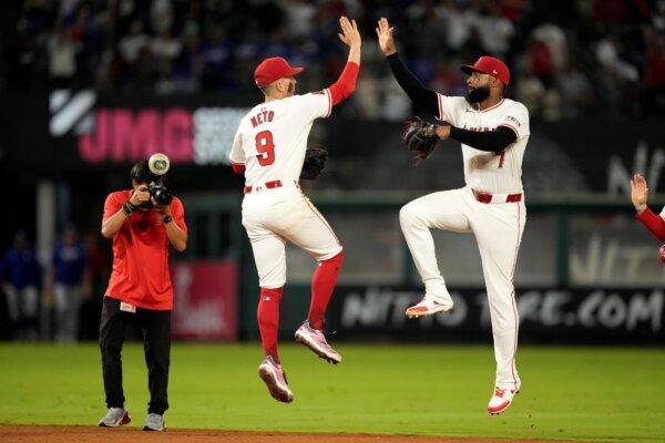 Zach Neto (L) and Jo Adell celebrate the Angels' victory over the rival Dodgers in Anaheim, Calif., on Sept. 4, 2024. (Mark J. Terrill/AP Photo)