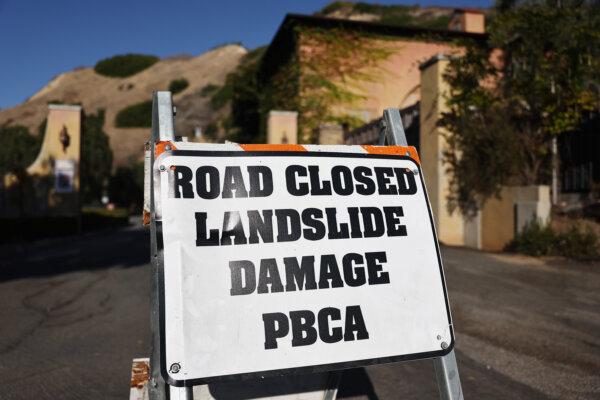 A sign reads 'Road Closed Landslide Damage' amid an ongoing land movement crisis in the area which has forced power shutoffs to homes, with California Gov. Gavin Newsom declaring a state of emergency in Rancho Palos Verdes, Calif., on Sept. 3, 2024. (Mario Tama/Getty Images)