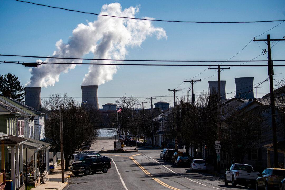 Steam rises from the nuclear plant on Three Mile Island, as seen from Goldsboro, Penn., on March 26, 2019. (Andrew Caballero-Reynolds/AFP via Getty Images)