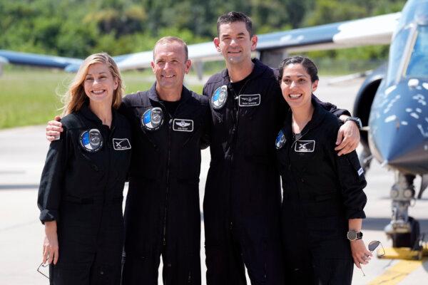 Mission specialist Anna Menon (L), pilot Scott Poteet (2nd L), commander Jared Isaacman (2nd R), and mission specialist Sarah Gillis (R) arrive at the Kennedy Space Center in Cape Canaveral, Fla., on Aug. 19, 2024. (John Raoux/AP Photo)