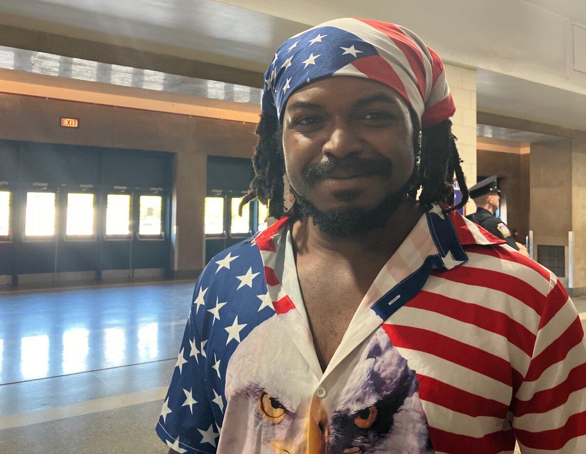 Chiedu Chika, 22, of Maryland, attends a town hall session with former President Donald Trump at New Holland Arena in Harrisburg, Pa., on Sept. 4, 2024. (Janice Hisle/The Epoch Times)