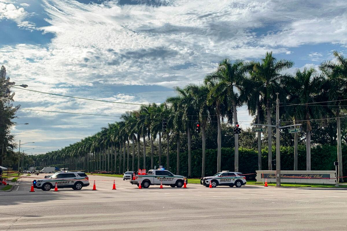 The Palm Beach County Sheriff’s Office closes off a portion of Summit Ave. alongside Trump International Golf Club, close to where an apparent assassination attempt on former President Donald Trump took place the day before, in Palm Beach, Fla., on Sept. 16, 2024. (T.J. Muscaro/The Epoch Times)