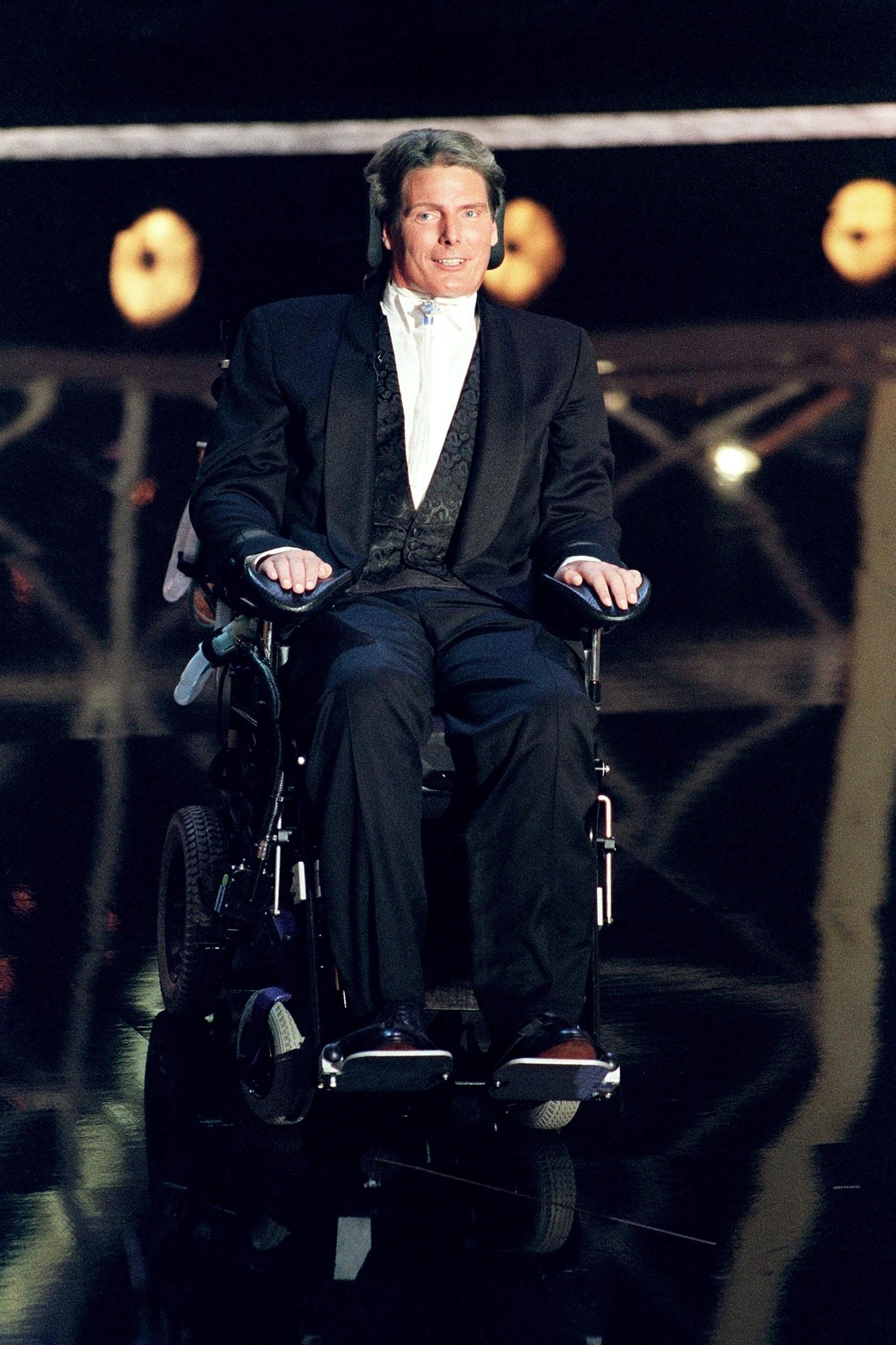 Reeve reads the winner of the Emmy for "Outstanding Supporting Actor for a Mini-series or Special" at the 1997 Emmy Awards. (Tiziana Sorge/ Getty Images)