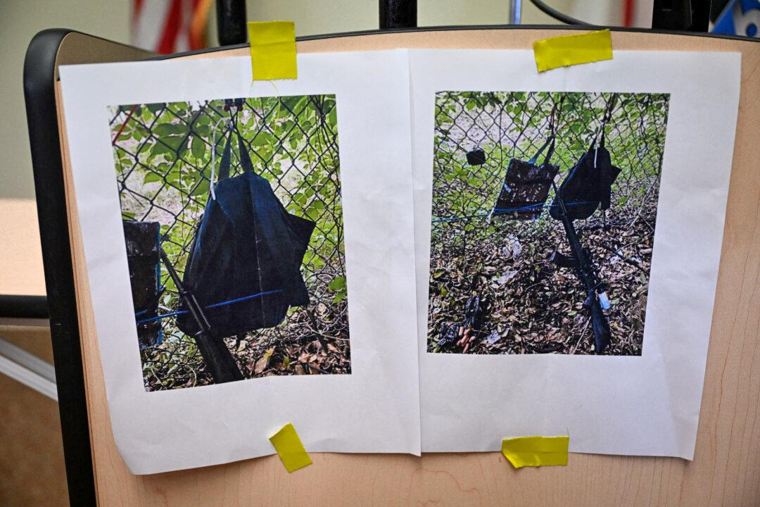 Pictures of evidence found at the fence of former President Donald Trump's golf course are shown at a press conference in West Palm Beach, Fla., on Sept. 15, 2024 following a shooting incident. (Chandan Khanna/AFP via Getty Images)