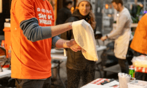 Nonprofit ‘Slice Out Hunger’ Partners With Pizzerias to Donate Pizza to People in Need