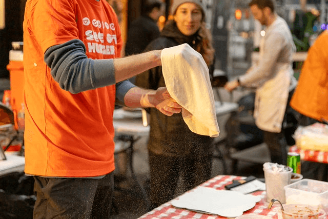 Nonprofit ‘Slice Out Hunger’ Partners With Pizzerias to Donate Pizza to People in Need