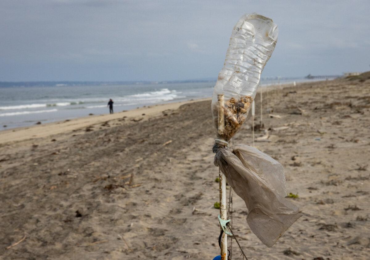 Trash lines the beaches near the Tijuana River mouth outside of San Diego on Sept. 19, 2024. (John Fredricks/The Epoch Times)