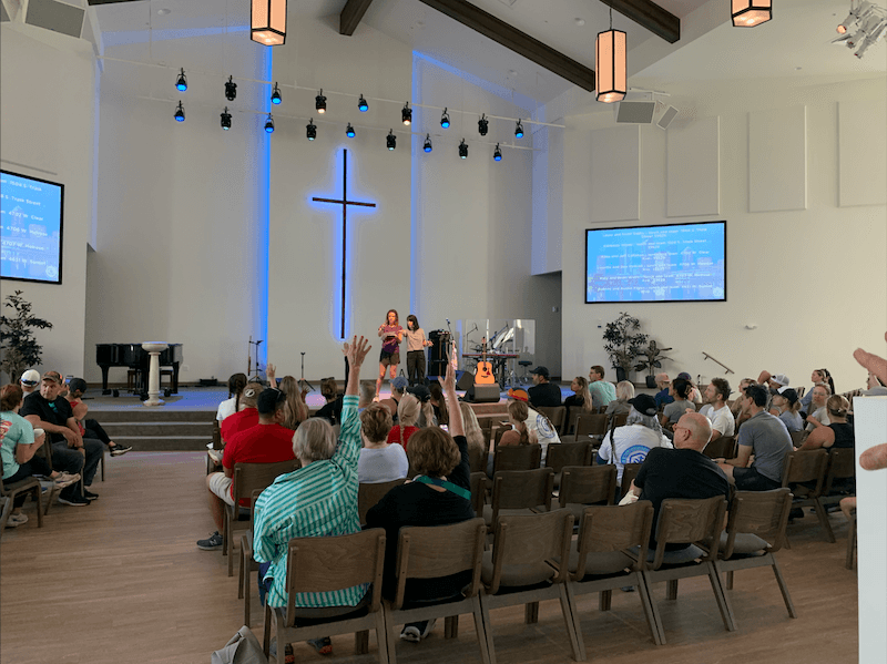 Members of the First Presbyterian Church of Tampa volunteer to help their neighbors recover from flooding after Hurricane Helene on Sept. 29, 2024. (T.J. Muscaro/The Epoch Times)