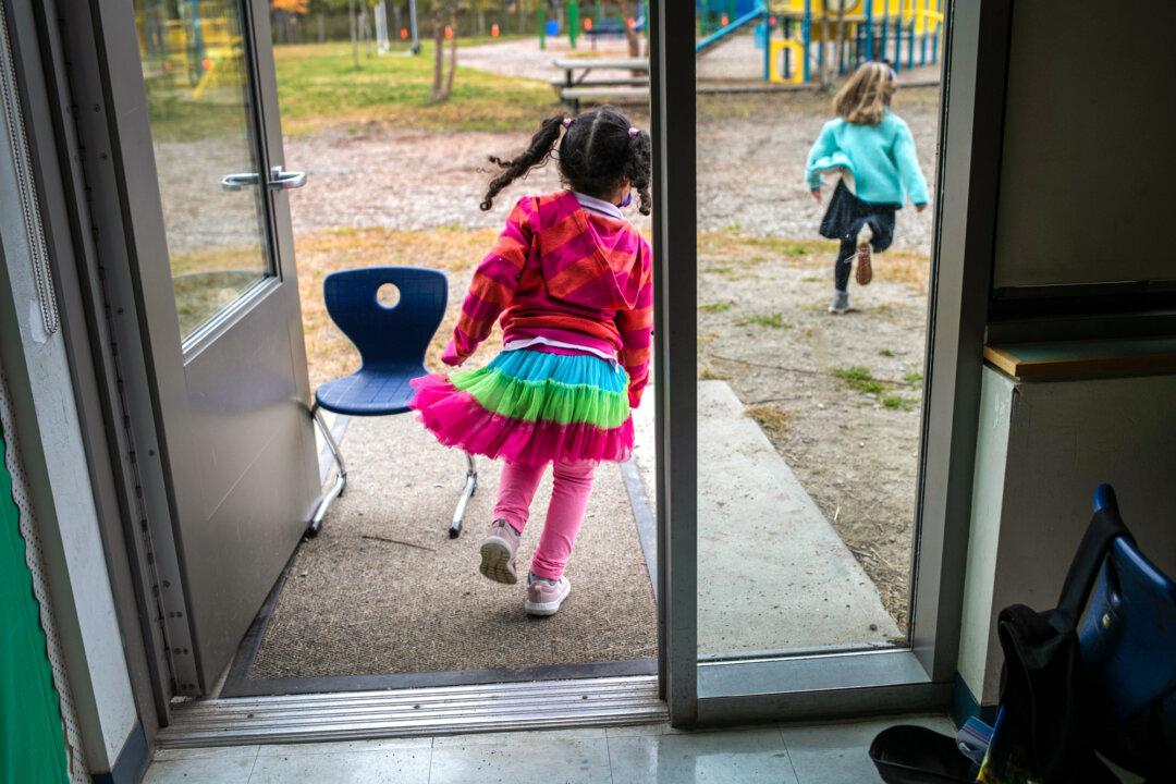 The new state law sets no age limit, so “schools cannot notify parents even if preschoolers socially transition,” the lawsuit filed by City of Huntington Beach states. (John Moore/Getty Images)