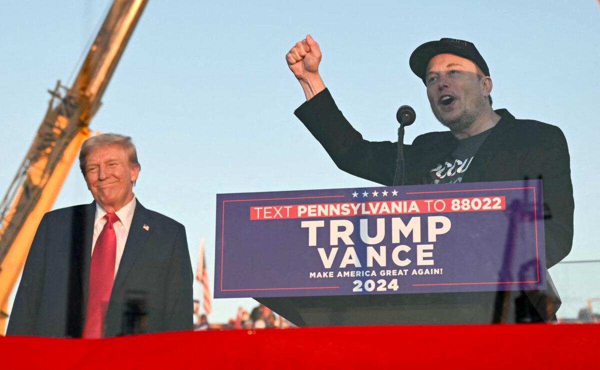 Tesla Motors CEO Elon Musk (R) speaks on stage as he joins former President and Republican presidential candidate Donald Trump during a campaign rally in Butler, Pa., on Oct. 5, 2024. (Jim Watson/AFP)