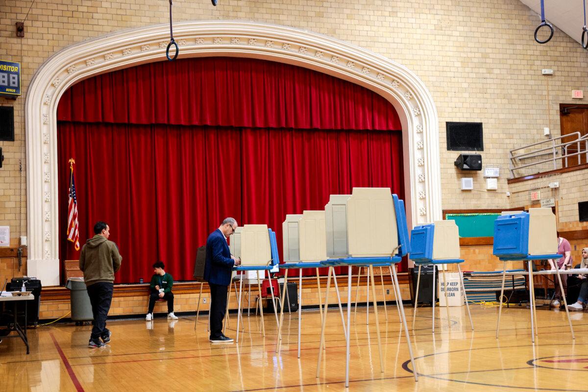 Voters cast their ballots during the Michigan presidential primary at a polling location in Dearborn, Mich., on Feb. 27, 2024. (Jeff Kowalsky/AFP via Getty Images)