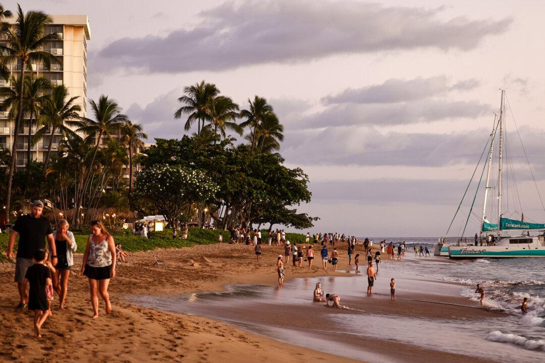 People gather on Kaanapali Beach, a popular tourist destination, near Lahaina, Hawaii, on Aug. 5, 2024. (Mario Tama/Getty Images)