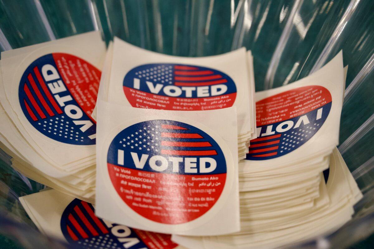 Sticker that read "I VOTED" in multiple languages at the Los Angeles County Registrar-Recorder/County Clerk in Norwalk, Calif., on Oct. 7, 2024. (Sophie Li/The Epoch Times)