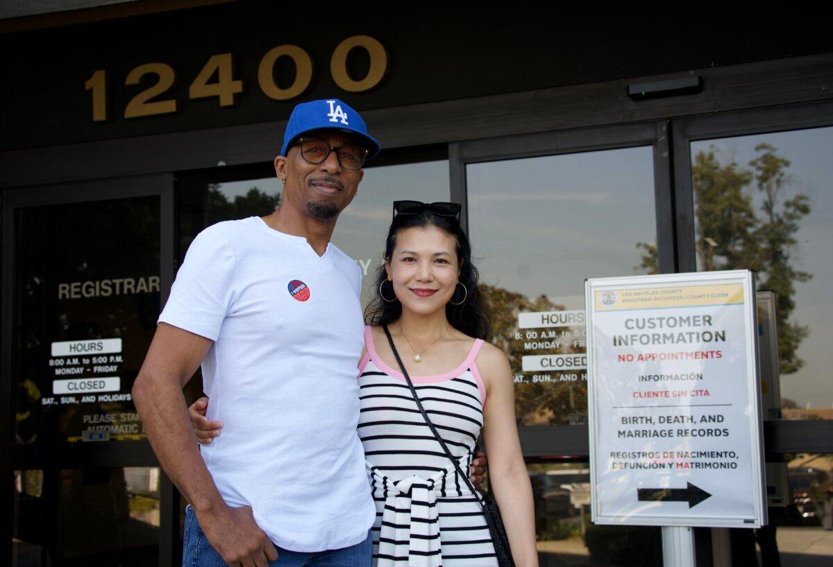 Michael Sidney (L) at the Los Angeles County Registrar-Recorder/County Clerk in Norwalk, Calif., on Oct. 7, 2024. (Sophie Li/The Epoch Times)