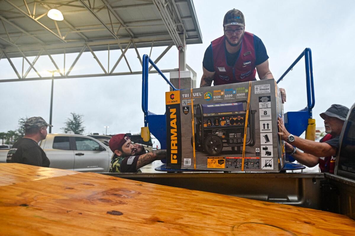 People prepare for the arrival of Hurricane Milton in Brandenton, Fla., on Oct. 9, 2024. (Miguel J. Rodriguez Carrillo/ AFP via Getty Images)