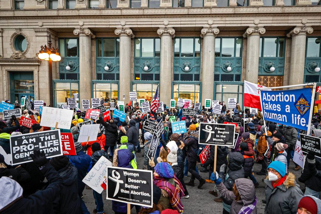 Pro-life advocates are greeted by counter protesters during the March For Life in Chicago on Jan. 8, 2022. (Kamil Krzaczynski/Getty Images)