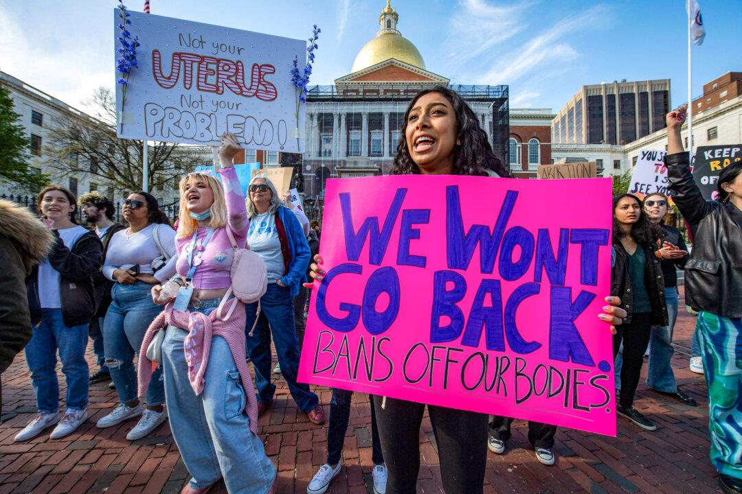 Pro-abortion demonstrators rally outside the State House during a rally in Boston on May 8, 2022. (Joseph Prezioso/AFP via Getty Images)