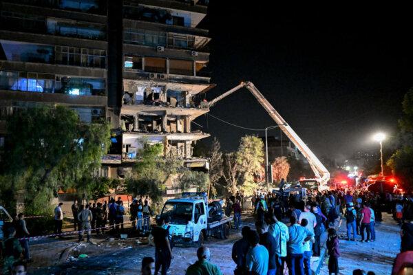 A view of a residential building hit by a reported Israeli air strike, in the Mazzeh suburb on the western outskirts of Syria's capital Damascus on Oct. 8, 2024. (Louai Beshara/AFP via Getty Images)