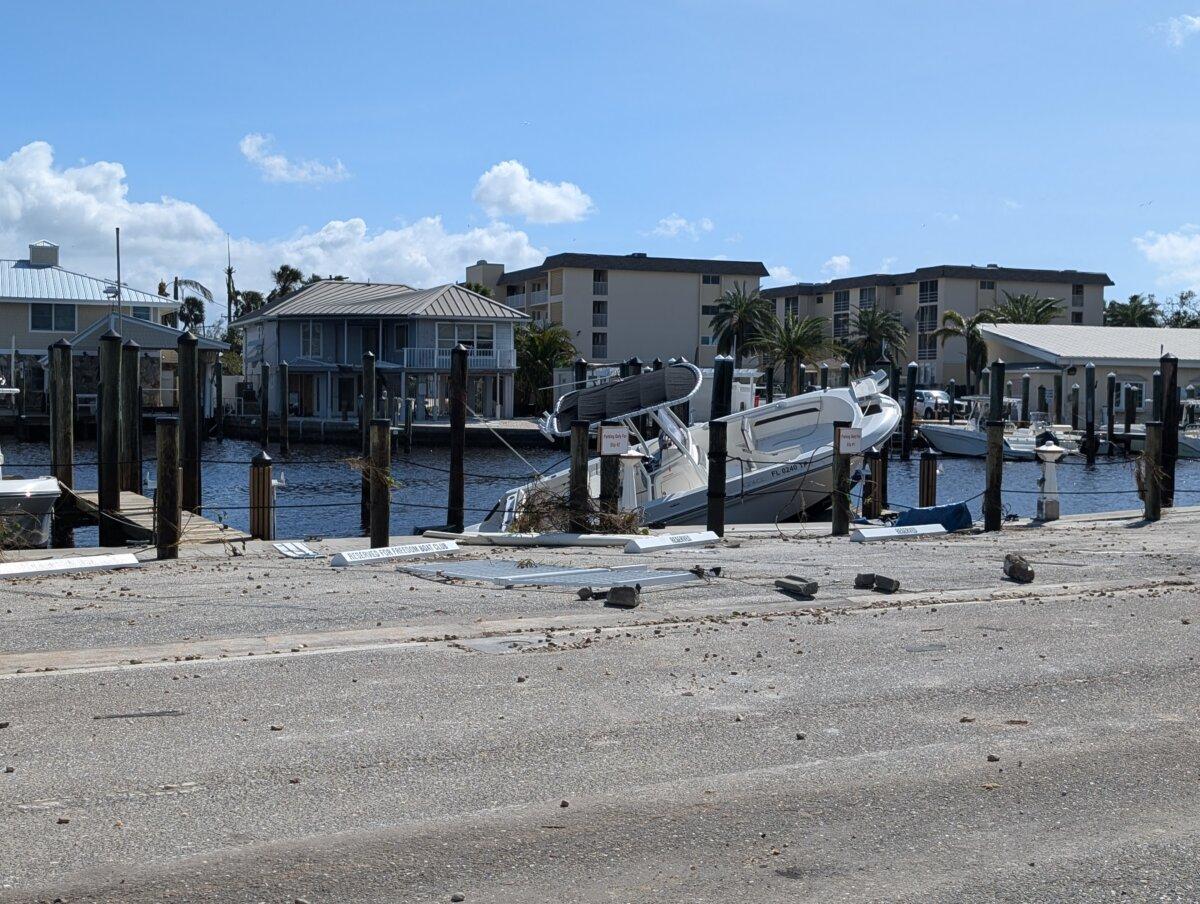 Boats along Tarpon Center Drive in Venice, Fla., show the strength of Hurricane Milton in the storm's wake, on Oct. 10, 2024. (Jacob Burg/The Epoch Times)