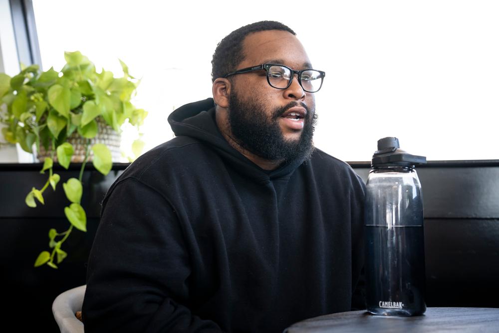 Jaleel Anderson speaks during an interview with The Epoch Times at a coffee shop in Royal Oak, Mich., on Oct. 12, 2024. (Madalina Vasiliu/The Epoch Times)