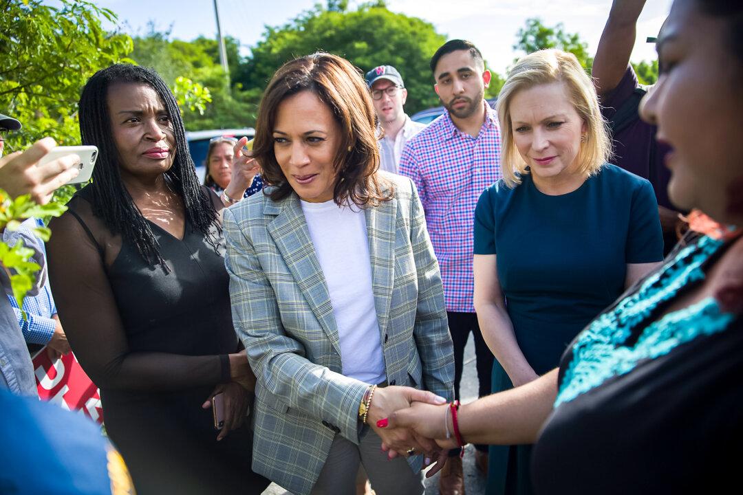 2020 presidential candidate, Sen. Kamala Harris (D-Calif.) (C), and Sen. Kirsten Gillibrand (D-N.Y.) (R) visit a detention center for unaccompanied minors in Homestead, Fla., on June 28, 2019. (Joe Raedle/Getty Images)