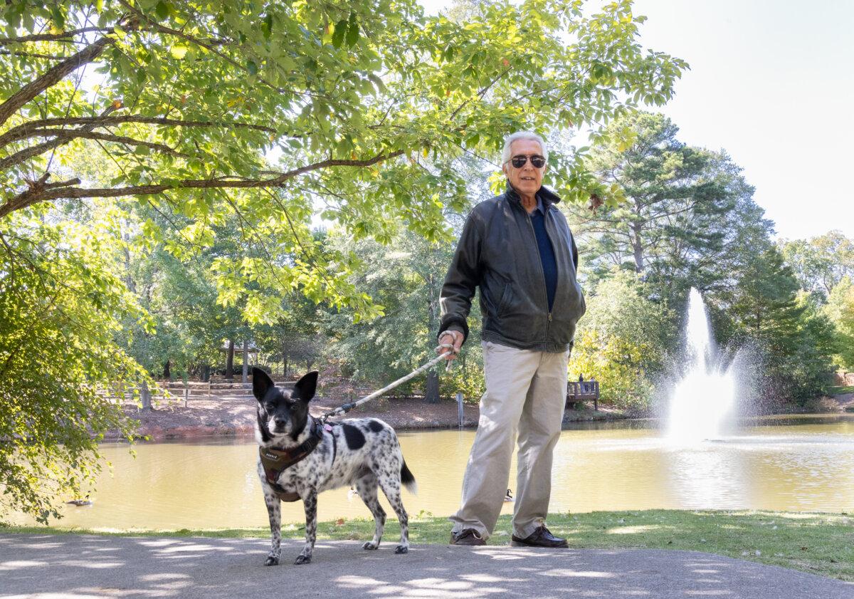 Leonard Freedman and his dog, Oscar Bonner, in Smyrna, Ga., on Oct. 15, 2024. (John Fredricks/The Epoch Times)