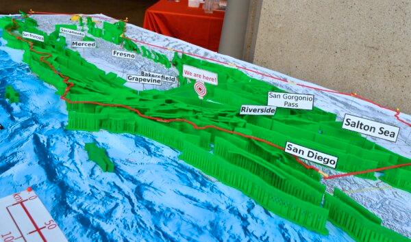 A 3D printed model of California Faults (in green), created by researcher Christos Kyriakopoulos from the faculty of the University of California, Riverside, is on display at the 10th annual Great ShakeOut Earthquake Drill in Los Angeles on Oct. 18, 2018. (Frederic J. Brown/AFP via Getty Images)