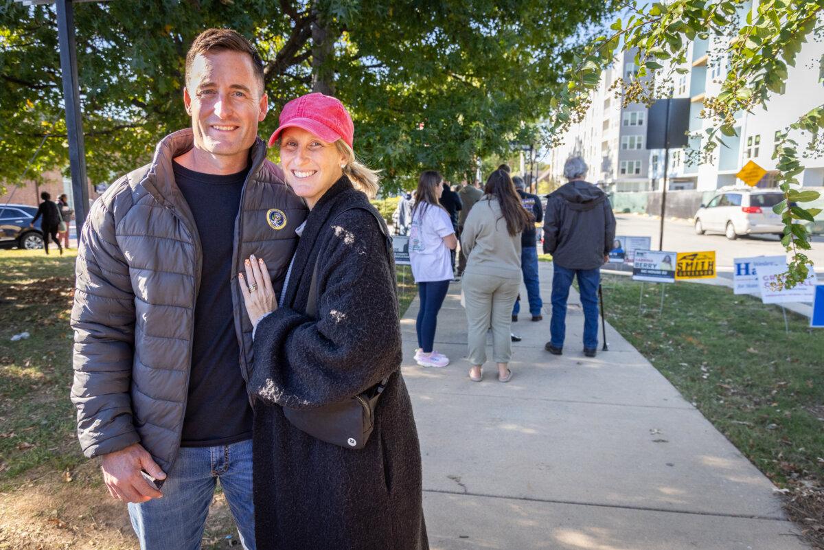 Jordan and Lauren Williams leave a voting center in Kannapolis, N.C., on Oct. 17, 2024. (John Fredricks/The Epoch Times)