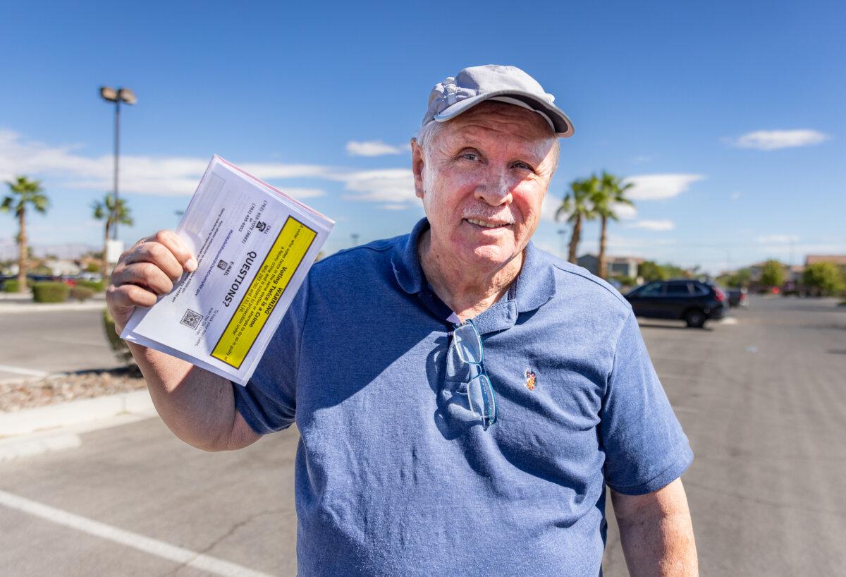 Arthur stands outside an early-voting site in northwestern Las Vegas on Oct. 19, 2024. (John Fredricks/The Epoch Times)