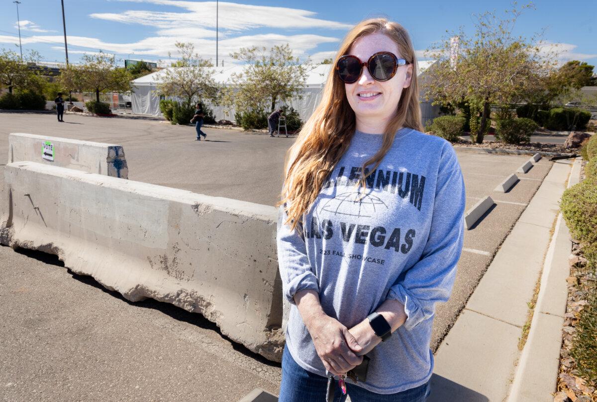 Shonna Wolkov stands outside a voting area in northwestern Las Vegas on Oct. 19, 2024. (John Fredricks/The Epoch Times)