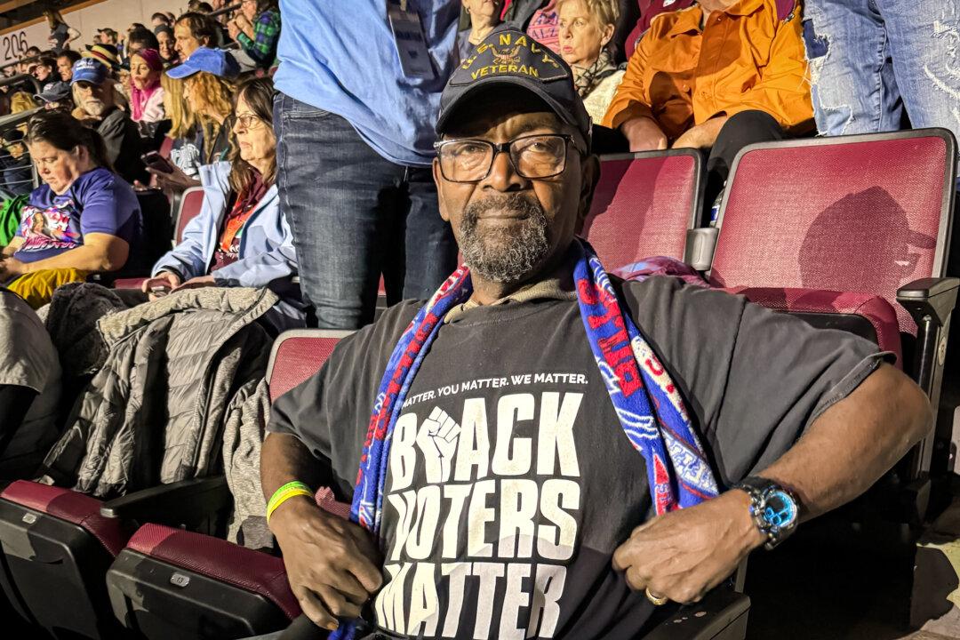 Collis Allan Jr., a truck driver, attends Vice President Kamala Harris's rally in Erie, Pa., on Oct. 14, 2024. (Arjun Singh/The Epoch Times)