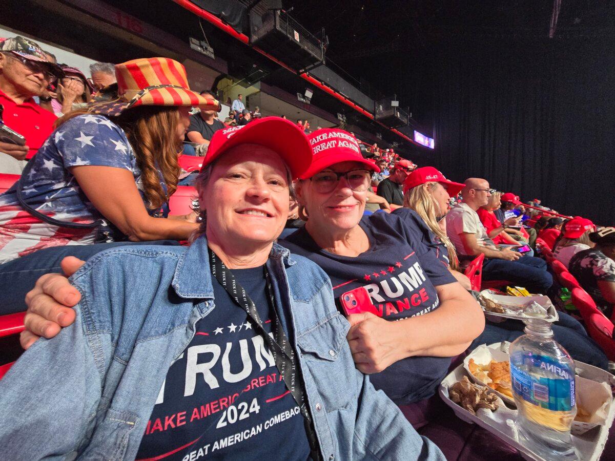 Linda Lebica (L) and Kathy Lauer (R) from Las Vegas were among 29,000 people who attended a campaign rally for former President Donald Trump in Las Vegas on Oct. 24, 2024. (Allan Stein/The Epoch Times)