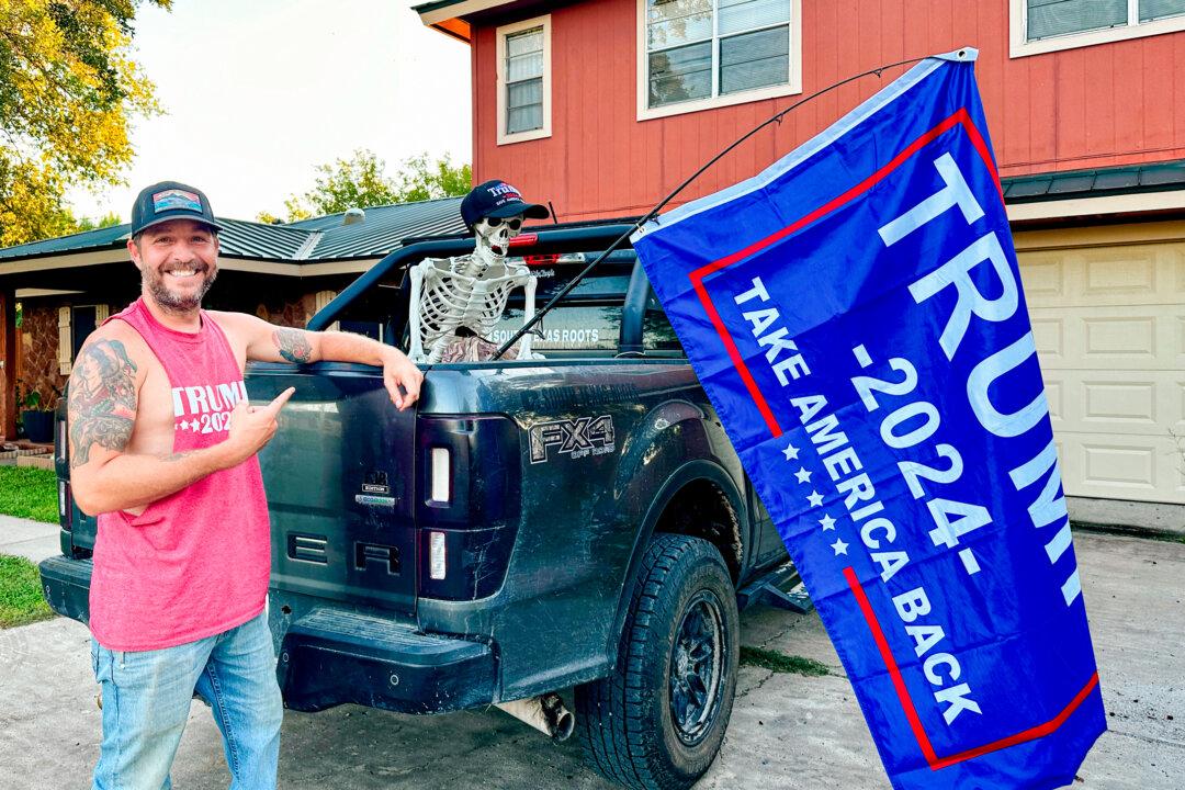 Jared Crocker shows off his pickup truck with a Trump flag in the Texas Rio Grande Valley on Sept. 30, 2024. He and his father, George Crocker, intend to vote for Trump. (Darlene McCormick Sanchez/The Epoch Times)