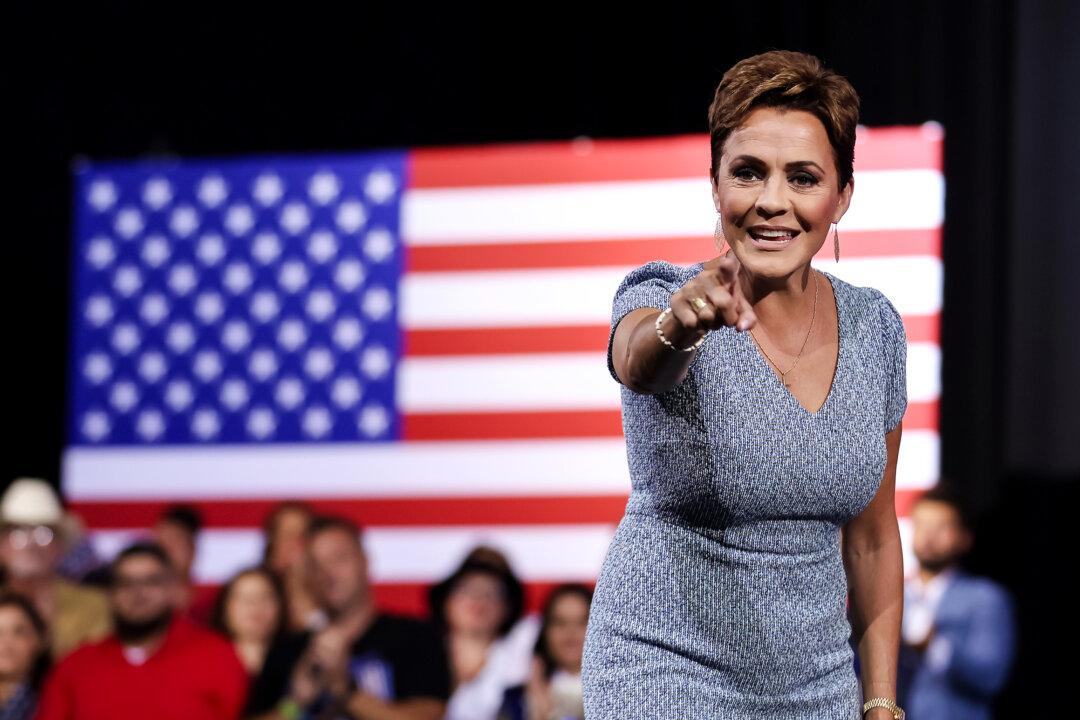 (Left) Rep. Ruben Gallego (D-Ariz.) takes the stage at a Harris campaign rally in Tucson on Oct. 18, 2024. (Right) Arizona Republican U.S. Senate candidate Kari Lake greets supporters during a Trump campaign event in Tucson on Sept. 12, 2024. (Rebecca Noble/AFP via Getty Images, Justin Sullivan/Getty Images)