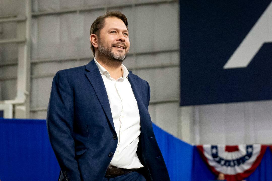 (Left) Rep. Ruben Gallego (D-Ariz.) takes the stage at a Harris campaign rally in Tucson on Oct. 18, 2024. (Right) Arizona Republican U.S. Senate candidate Kari Lake greets supporters during a Trump campaign event in Tucson on Sept. 12, 2024. (Rebecca Noble/AFP via Getty Images, Justin Sullivan/Getty Images)