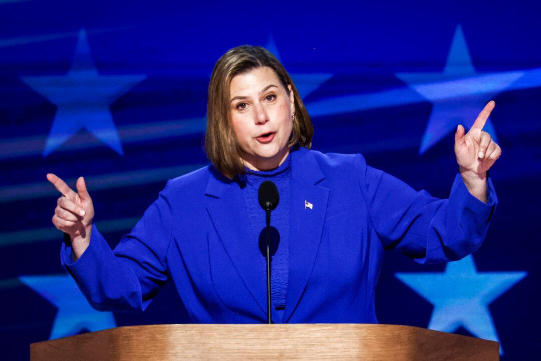 (Left) Rep. Elissa Slotkin (D-Mich.) speaks during the final day of the Democratic National Convention in Chicago on Aug. 22, 2024. (Right) Former Rep. Mike Rogers (R-Mich.) speaks at a Trump campaign event in Walker, Mich., on Sept. 27, 2024. (Chip Somodevilla/Getty Images, Scott Olson/Getty Images)