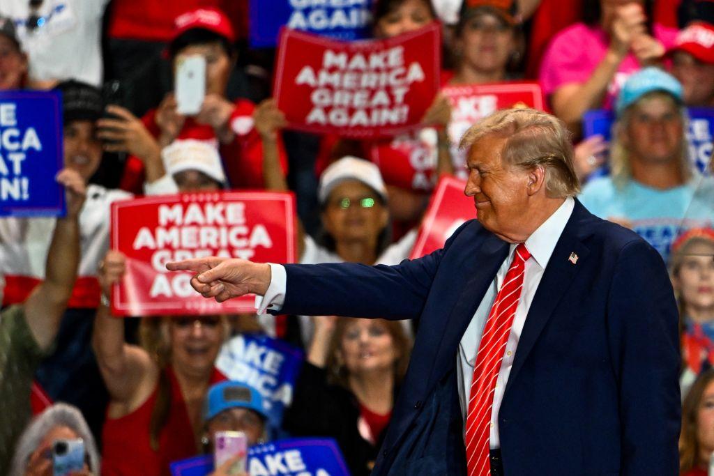 Former President Donald Trump gestures as he leaves a campaign rally in Rocky Mount, N.C., on Oct. 30, 2024. (Chandan Khanna/AFP via Getty Images)