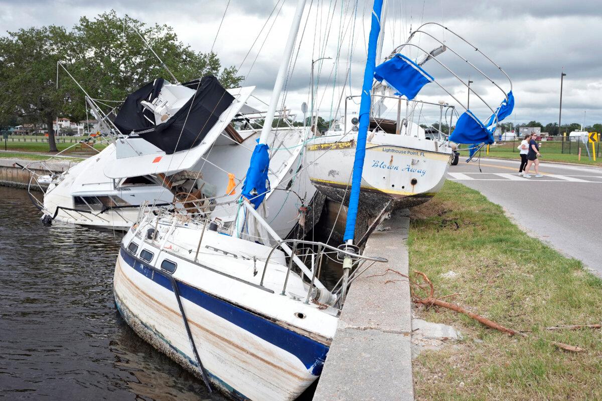 Boats damaged during Hurricane Helene are shown on the Davis Islands Yacht Basin ahead of the possible arrival of Hurricane Milton in Tampa, Fla., on Oct. 7, 2024. (Chris O'Meara/AP Photo)