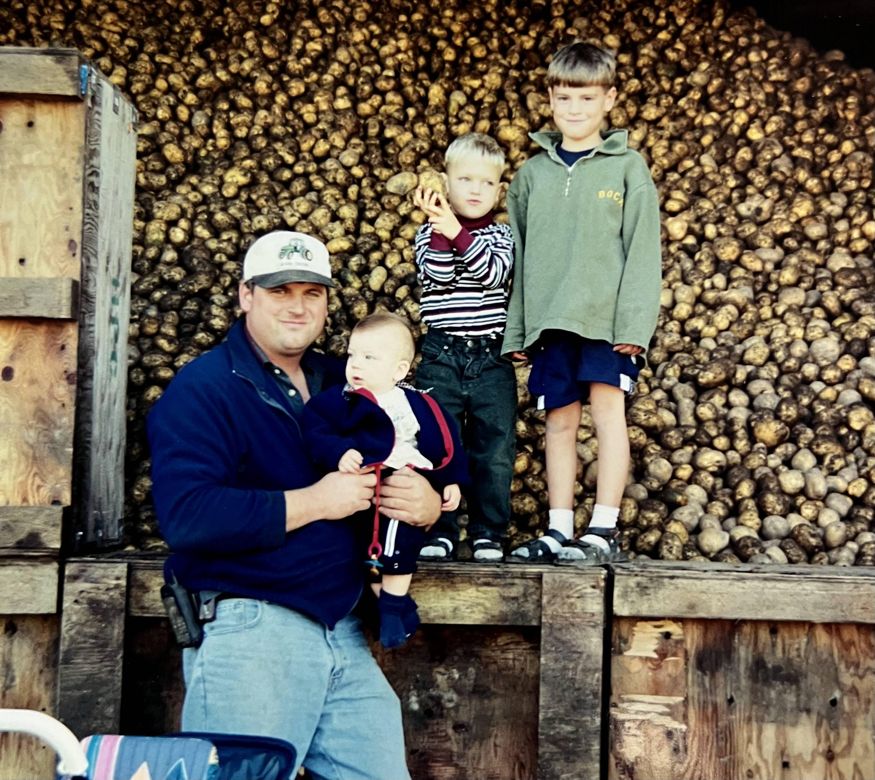 Tyler (first to the right) with his father and brothers, at the family farm. (Courtesy of Tyler Heppell)