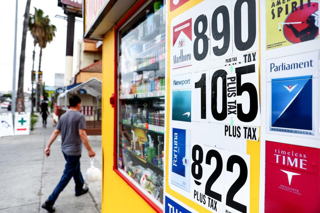 A sign advertises cigarettes outside a shop in Los Angeles on April 28, 2022. (Mario Tama/Getty Images)