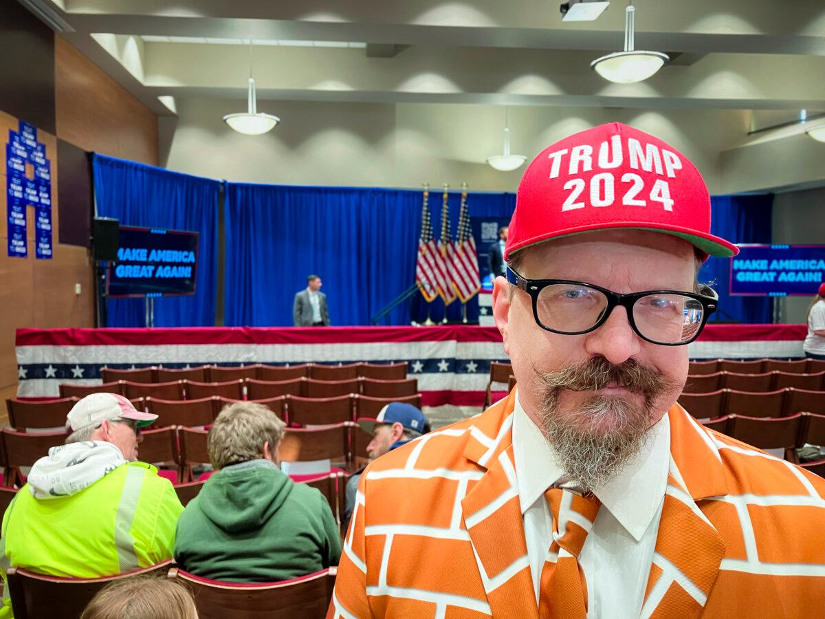 Blake Marnell, known to some as Brick Suit for the garb he wears at rallies for former President Donald Trump, attends a campaign event at Simpson College in Indianola, Iowa on Jan. 14, 2024. (Janice Hisle/The Epoch Times)